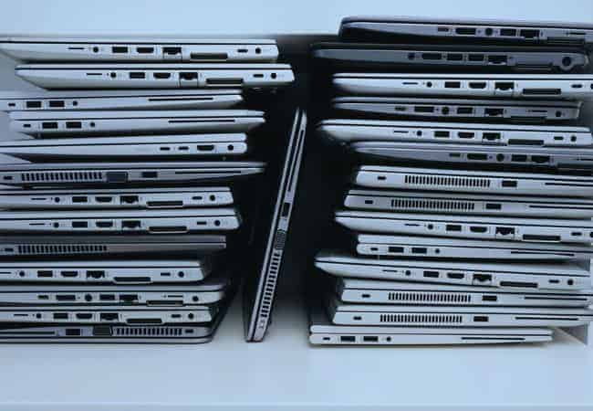 Stack of Chromebooks to be tested